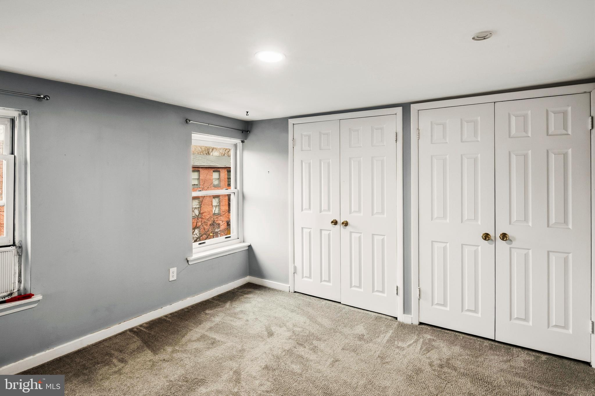 636 Portland Street Baltimore, MD 21230 - Photo 17 of 20 an empty room with windows