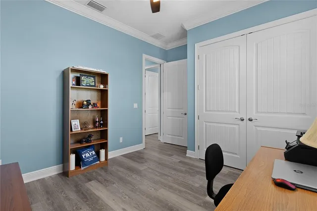 an aerial view of a house with a garden