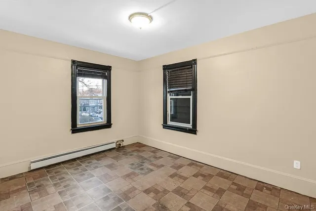 an empty room with windows