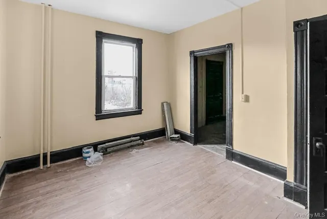 an empty room with windows