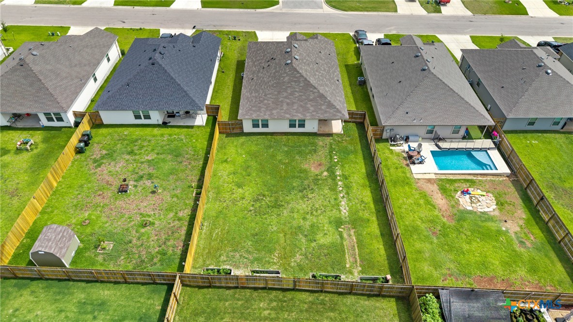 8903 Cantera Rdg Road Temple, TX 76502 - Photo 24 of 25 an aerial view of residential houses with outdoor space and swimming pool