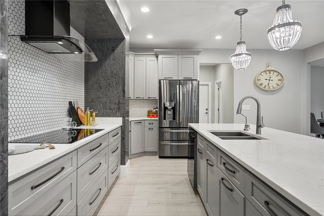 140 Turnberry Road Anderson, SC 29621 - Photo 12 of 44 This chef's kitchen features high-end appliances, an expansive island, and ample cabinetry for culinary enthusiasts.