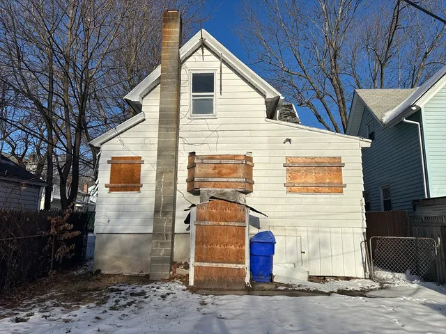 a front view of a house with a garage