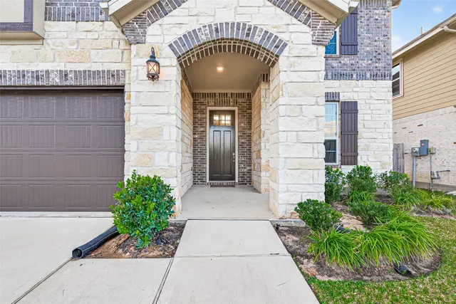 a view of a entryway door of house