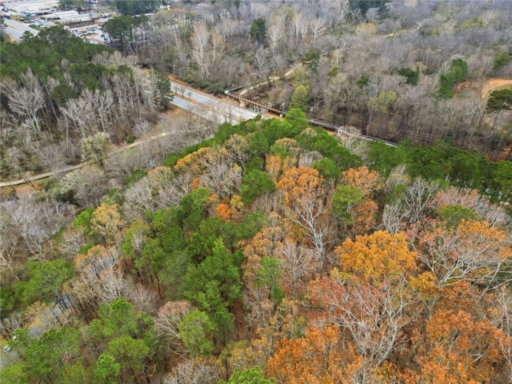 0 Mohawk Trail Suwanee, GA 30024 - Photo 13 of 17 a view of a yard with plants and tree