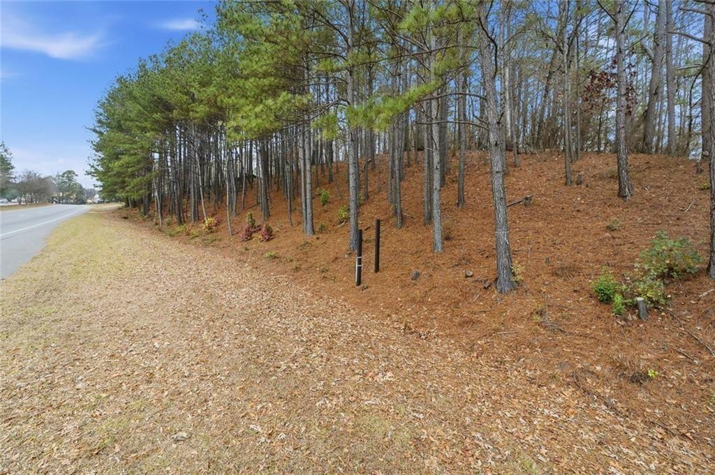 0 Mohawk Trail Suwanee, GA 30024 - Photo 2 of 17 a backyard of a house with lots of green space