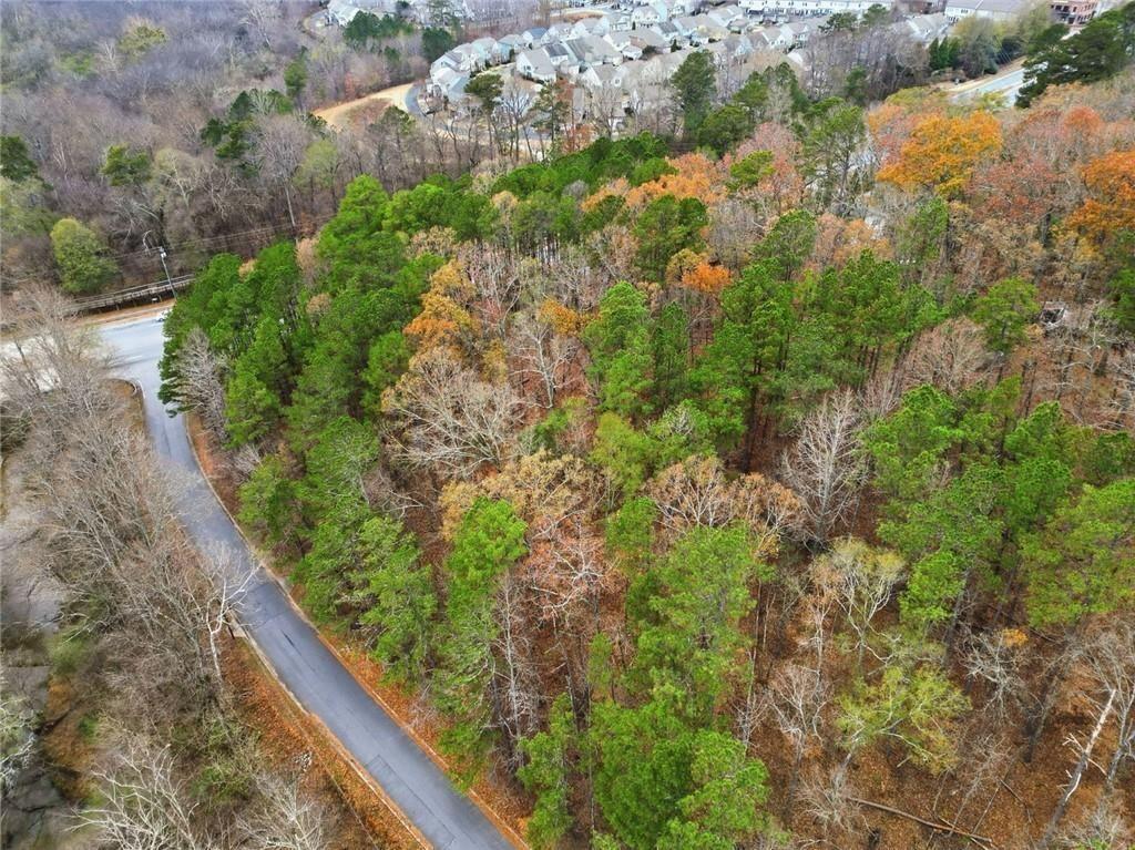 0 Mohawk Trail Suwanee, GA 30024 - Photo 4 of 17 a view of a garden with a house