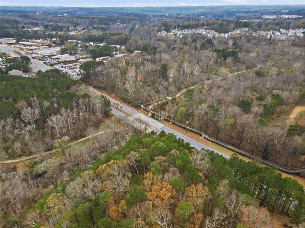 0 Mohawk Trail Suwanee, GA 30024 - Photo 9 of 17 an aerial view of residential houses with outdoor space and trees