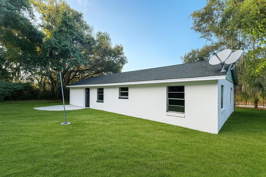 2871 West Albatross Road Avon Park, FL 33825 - Photo 11 of 11 a house that is sitting in the grass