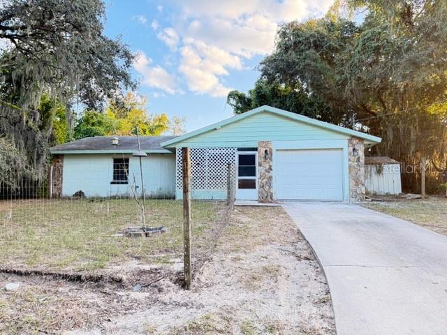 2871 West Albatross Road Avon Park, FL 33825 - Photo 2 of 11 a view of a house with a yard and large tree
