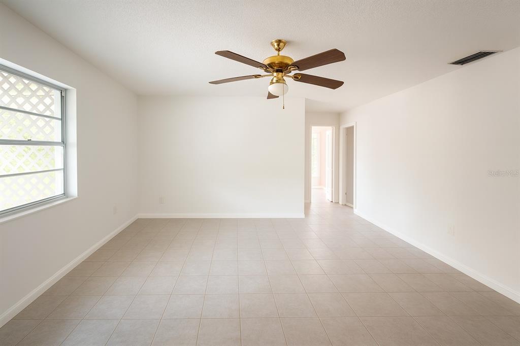 2871 West Albatross Road Avon Park, FL 33825 - Photo 7 of 11 a view of an empty room with a window