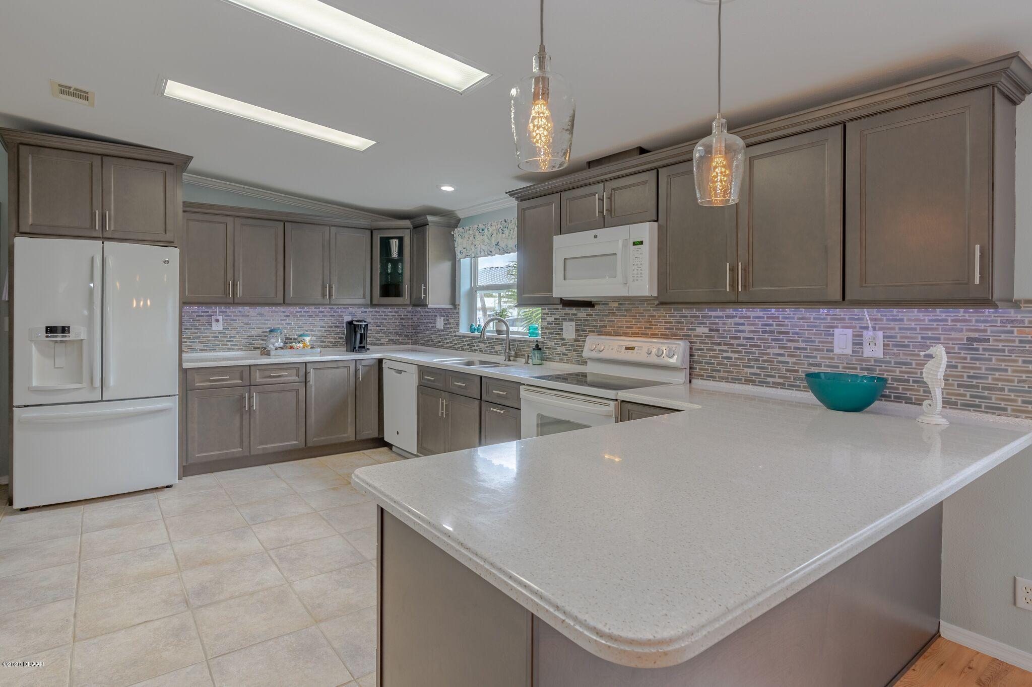 775 Navigators Way Edgewater, FL 32141 - Photo 11 of 51 Kitchen