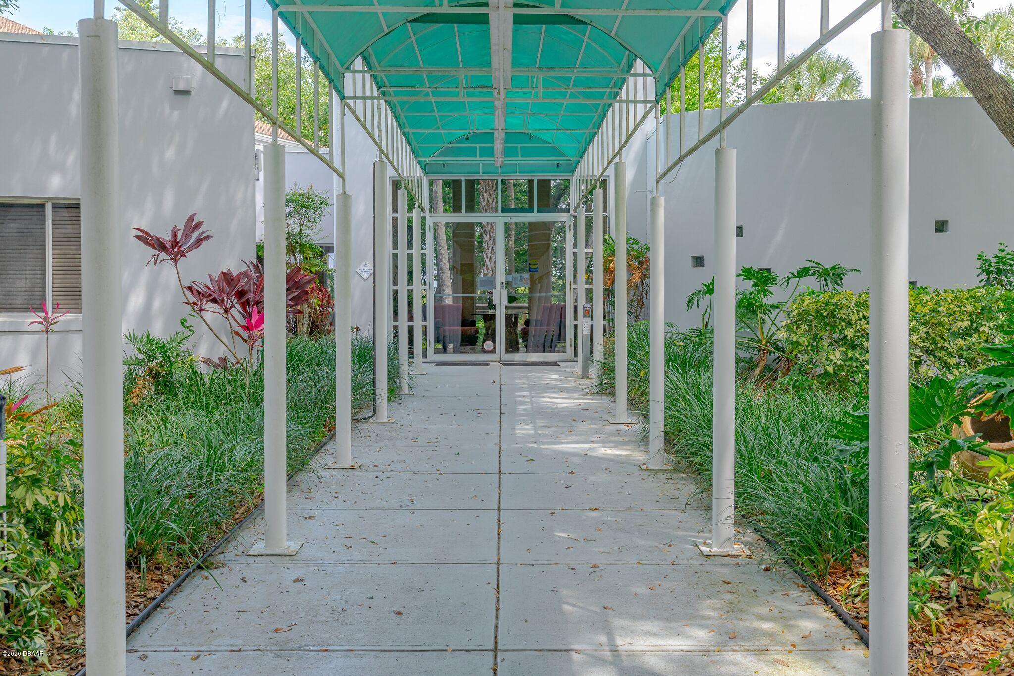 775 Navigators Way Edgewater, FL 32141 - Photo 26 of 51 Clubhouse Entrance