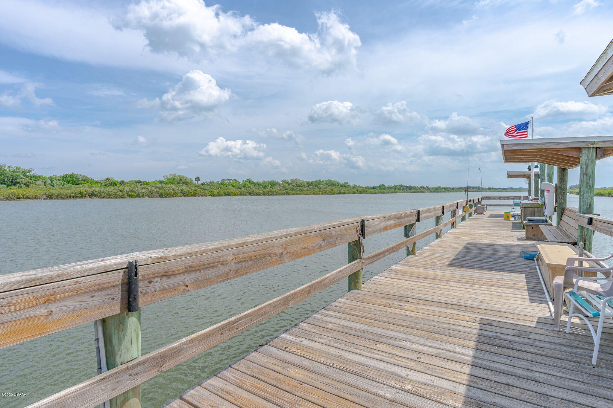 775 Navigators Way Edgewater, FL 32141 - Photo 43 of 51 Fishing Dock