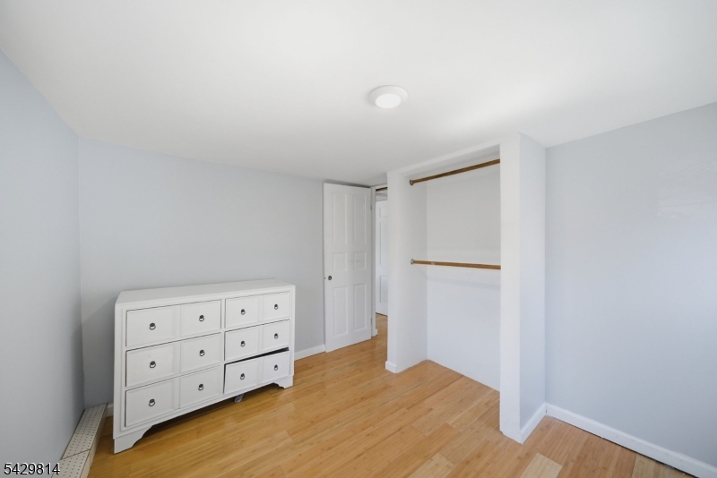251 Russia Road Oak Ridge, NJ 07438 - Photo 24 of 34 a view of room with cabinet and mirror