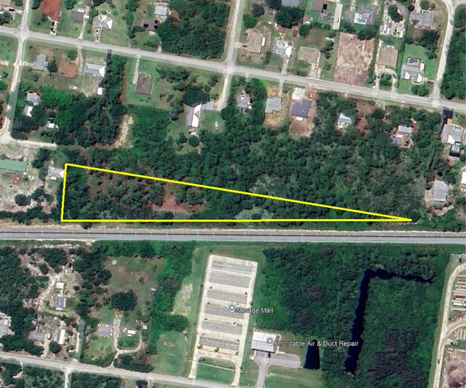 Tbd 133 Place Sebastian, FL 32958 - Photo 11 of 13 a view of swimming pool with a yard