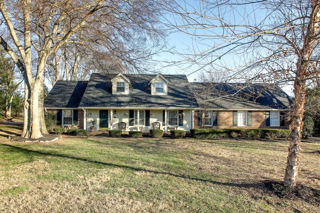 127 Baltusrol Road Franklin, TN 37069 - Photo 1 of 23 a front view of a house with a yard