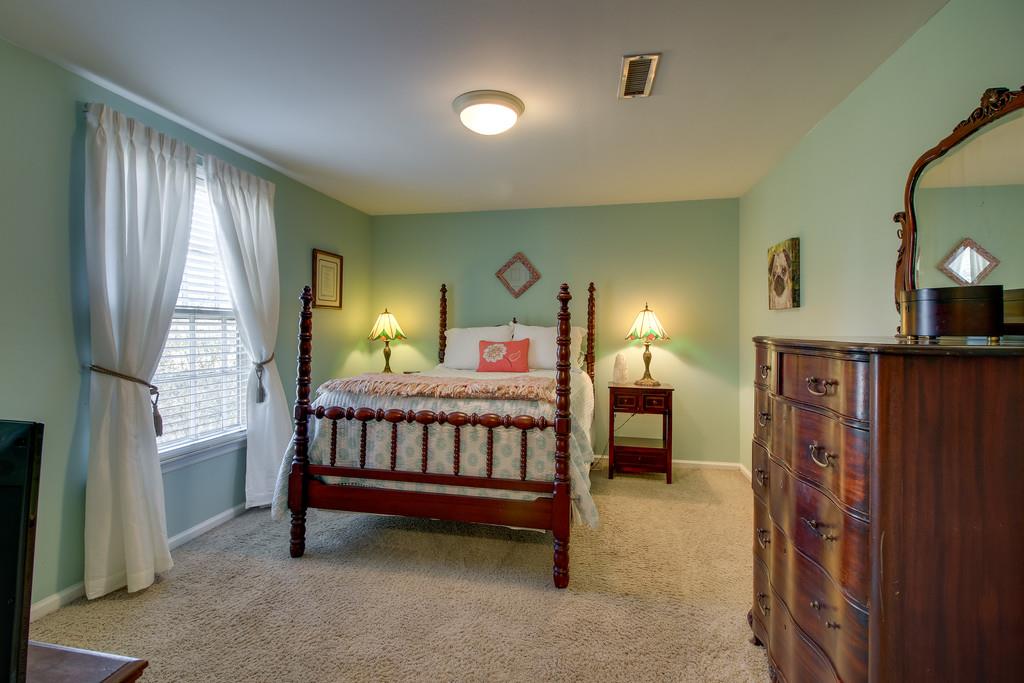 127 Baltusrol Road Franklin, TN 37069 - Photo 14 of 23 a bedroom with furniture and a window