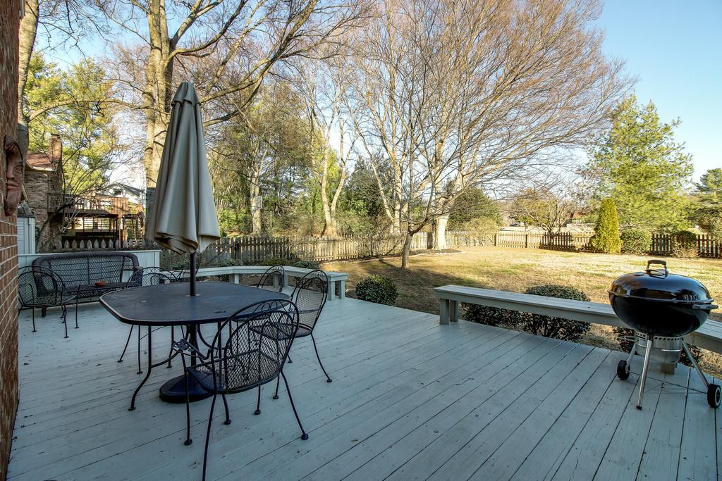 127 Baltusrol Road Franklin, TN 37069 - Photo 19 of 23 a view of a swimming pool with a table and chairs