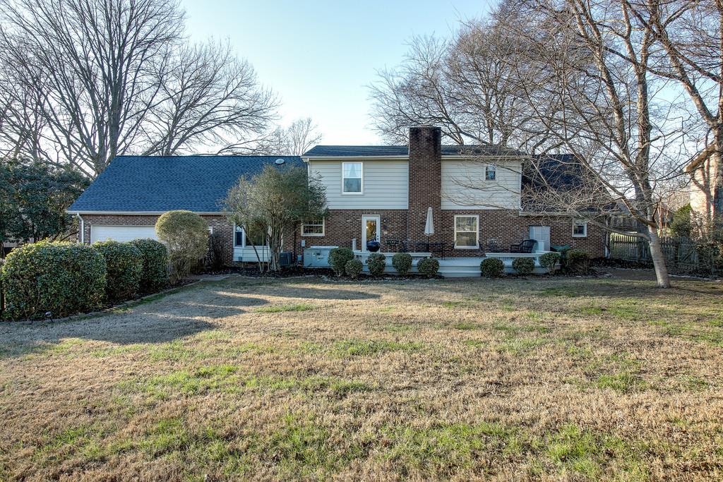 127 Baltusrol Road Franklin, TN 37069 - Photo 21 of 23 a front view of a house with a yard and garage