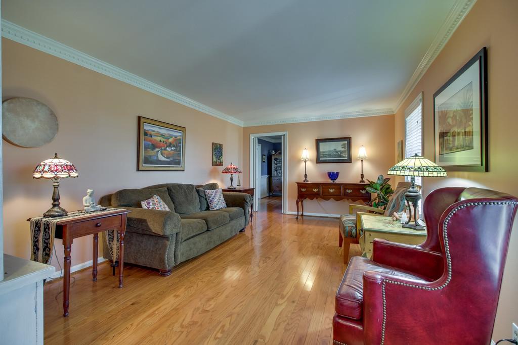 127 Baltusrol Road Franklin, TN 37069 - Photo 4 of 23 a living room with furniture fireplace and a window