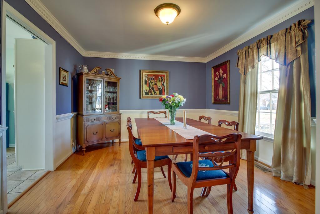127 Baltusrol Road Franklin, TN 37069 - Photo 6 of 23 a view of a dining room with furniture window and wooden floor