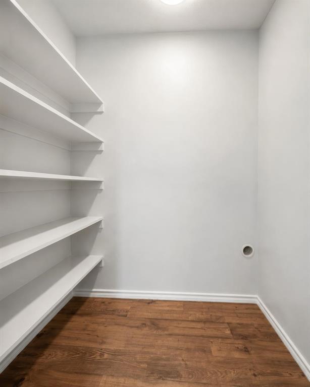 1974 County Road Powderly, TX 75473 - Photo 15 of 28 a view of an empty walk in closet