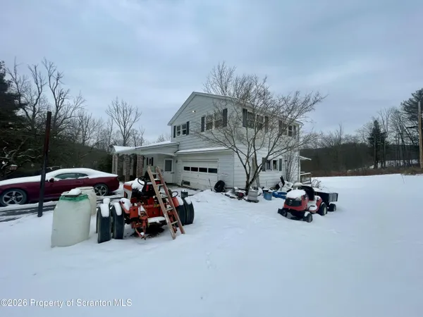 a car parked in front of a house