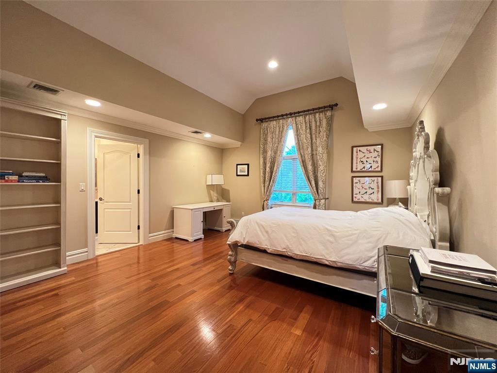 22 Reiner Place Englewood Cliffs, NJ 07632 - Photo 31 of 37 a bed room with a bed and a television