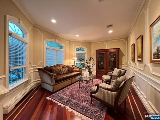 a living room with furniture or couch and a large window