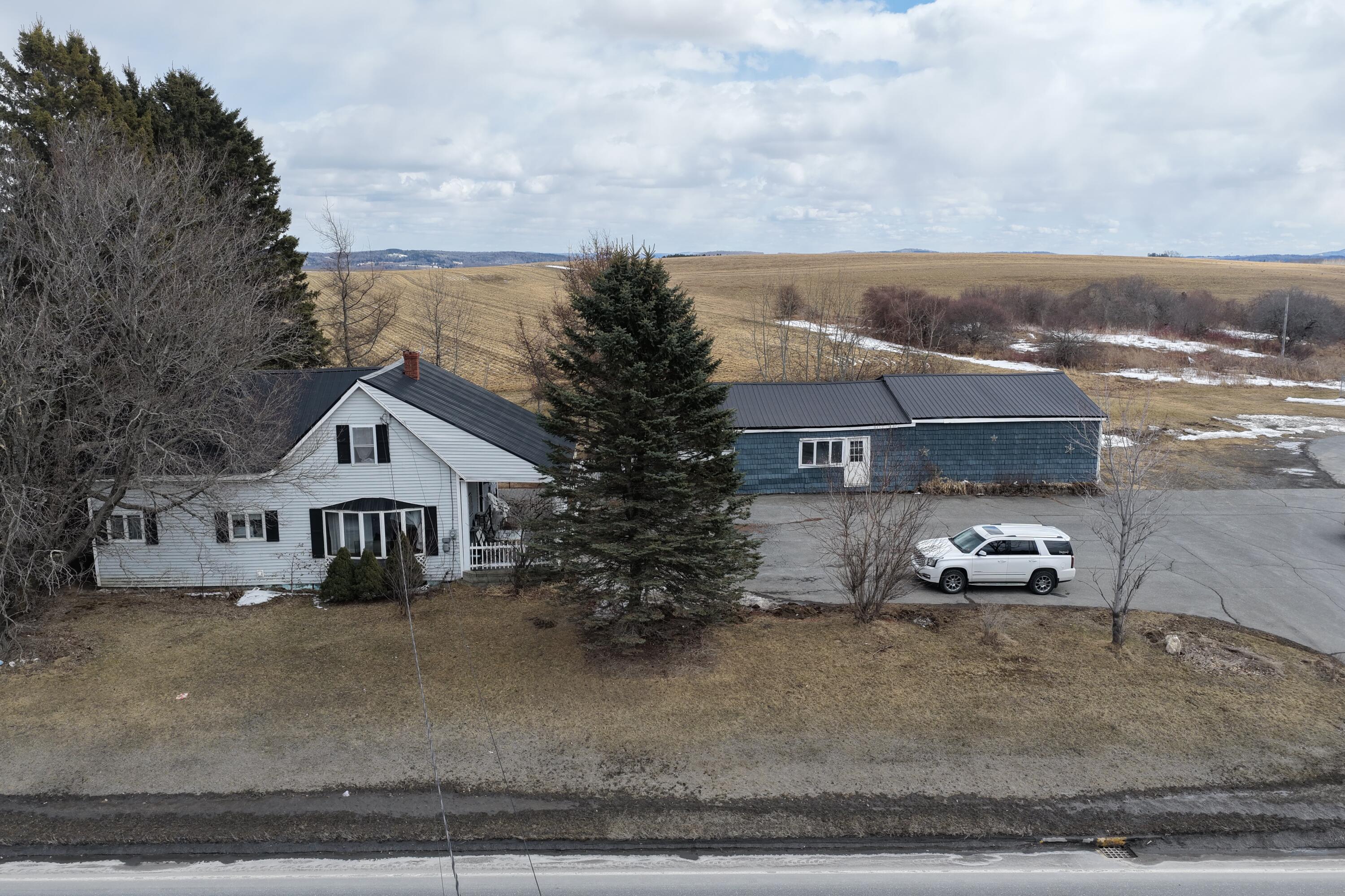 145 Caribou Road Presque Isle, ME 04769 - Photo 2 of 40 DJI_20260325014054_0300_D