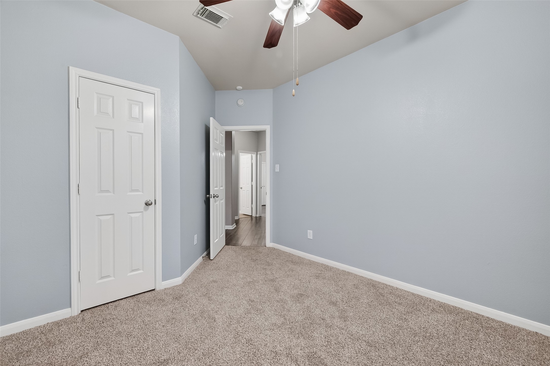 22419 Toronado Ridge Lane Porter, TX 77365 - Photo 18 of 35 an empty room with chandelier fan