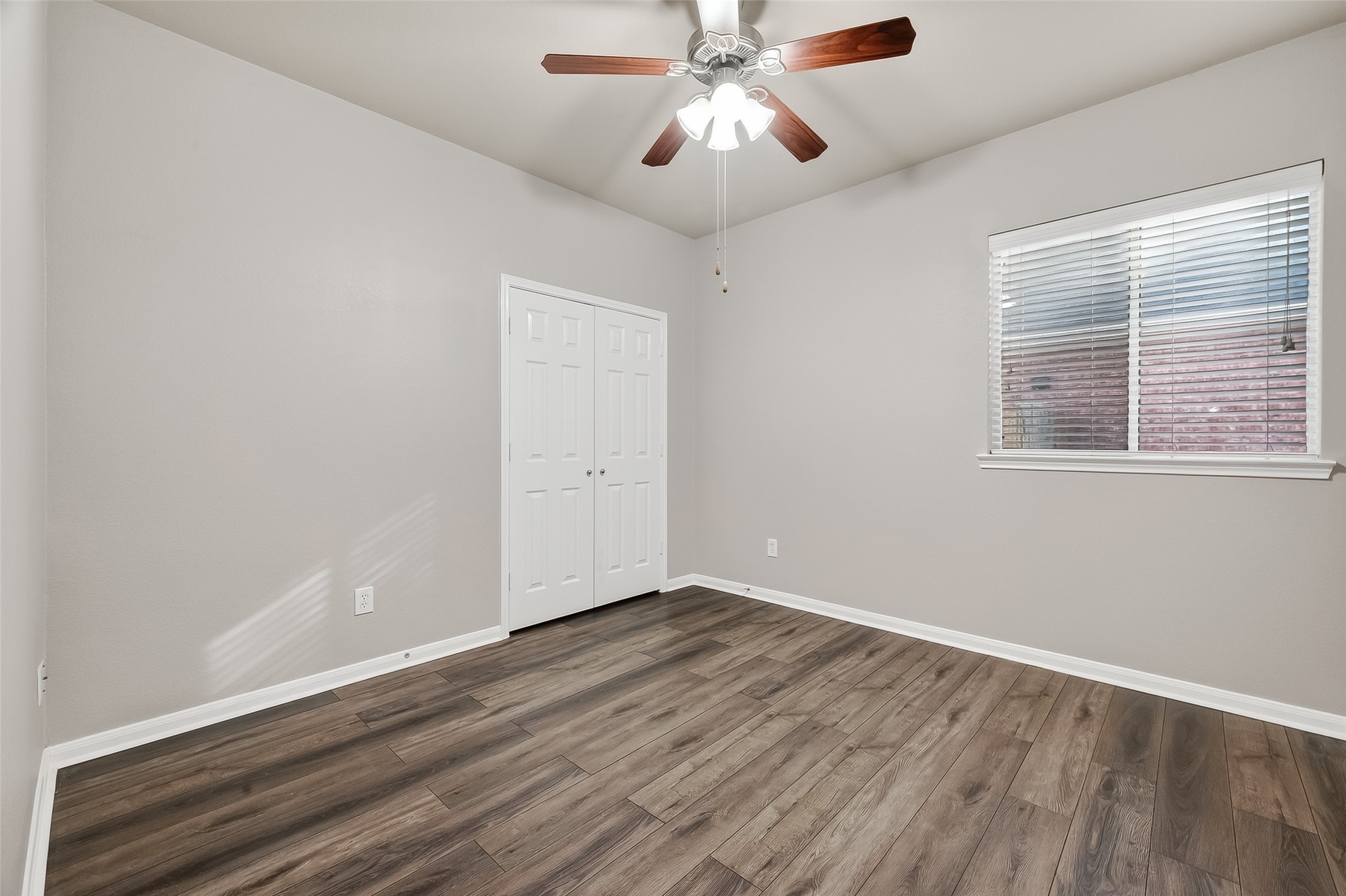 22419 Toronado Ridge Lane Porter, TX 77365 - Photo 19 of 35 a view of empty room with wooden floor and fan