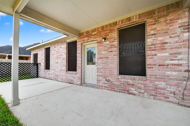 a view of front door of house with stairs