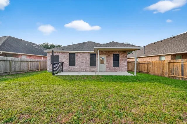 a front view of a house with yard