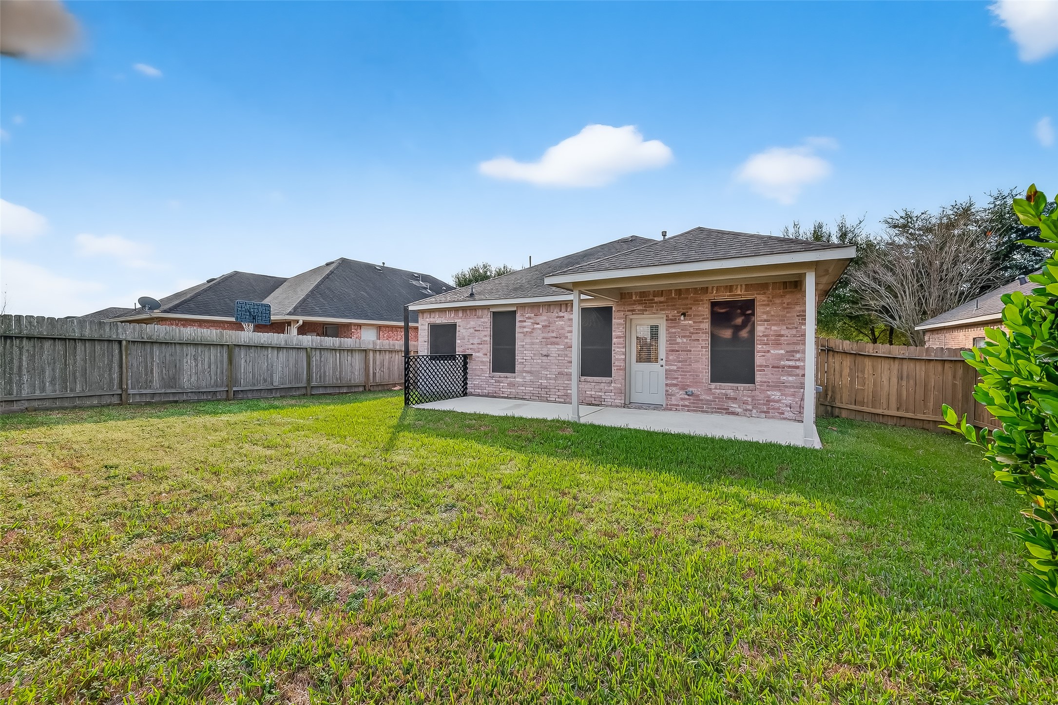 22419 Toronado Ridge Lane Porter, TX 77365 - Photo 34 of 35 a view of a house with a backyard