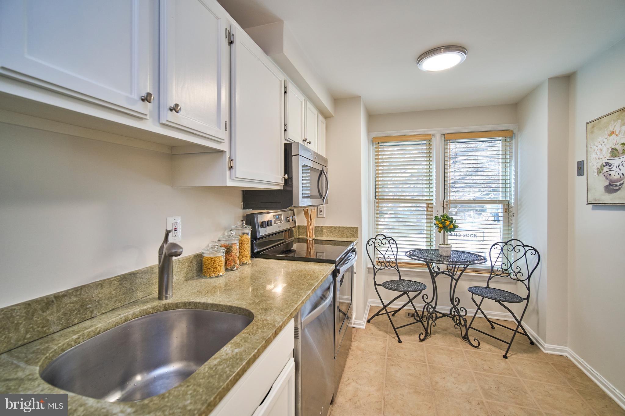 2149 Whisper Way Reston, VA 20191 - Photo 3 of 30 Eat in kitchen w/ tile floor & granite countertops