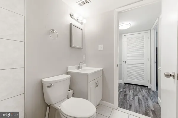 a view of a bedroom from a hallway