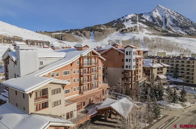 a view of a building with a yard