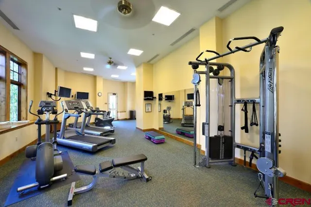 a view of a room with gym equipment