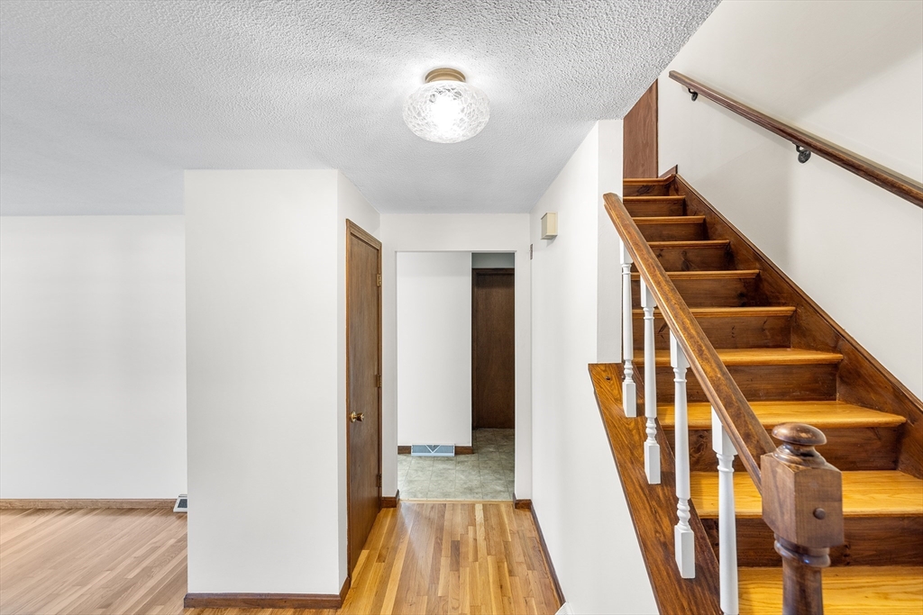 230 Irondequoit Road Franklin, MA 02038 - Photo 11 of 36 a view of an entryway with wooden floor