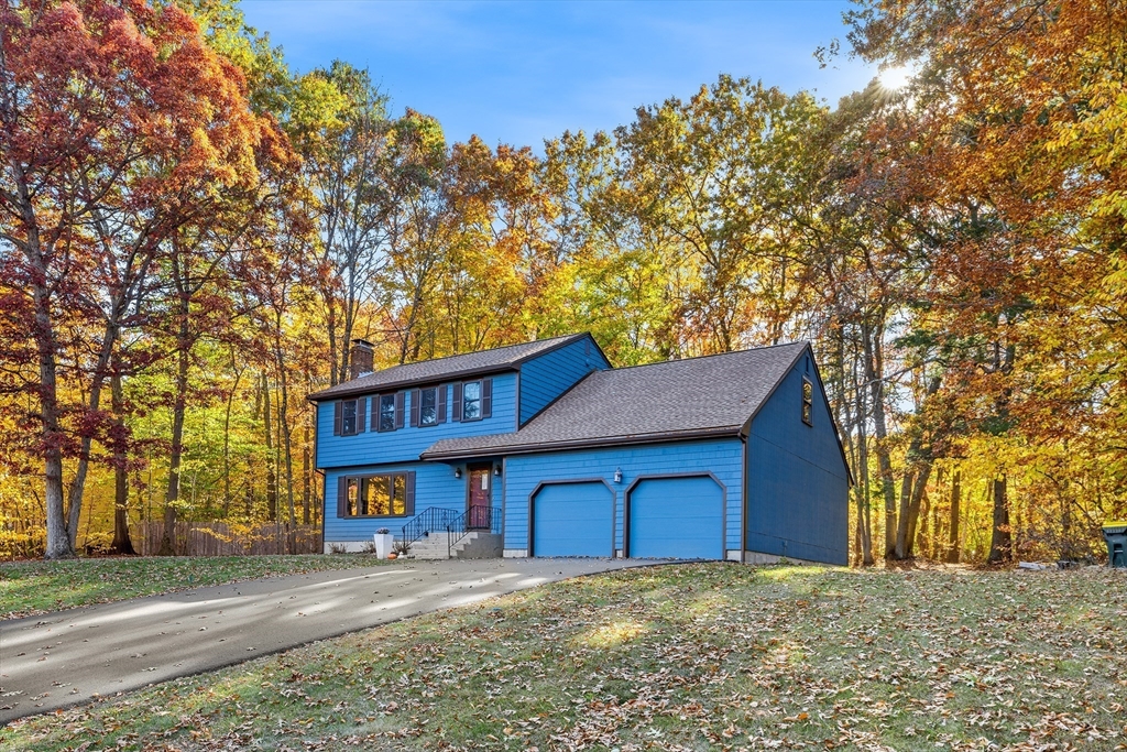 230 Irondequoit Road Franklin, MA 02038 - Photo 2 of 36 a front view of a house with a yard