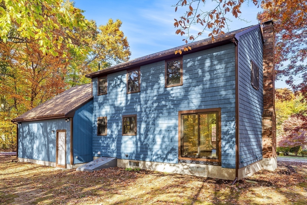 230 Irondequoit Road Franklin, MA 02038 - Photo 31 of 36 a view of a house with a small yard