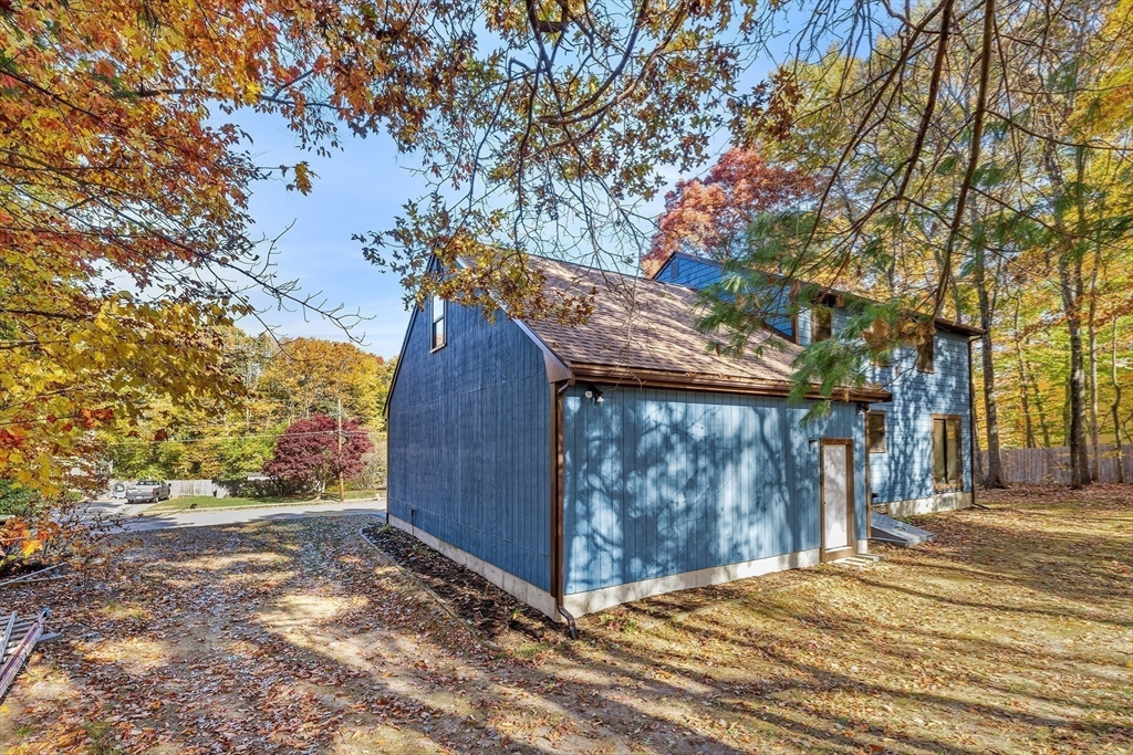 230 Irondequoit Road Franklin, MA 02038 - Photo 34 of 36 a view of a wooden door and a tree