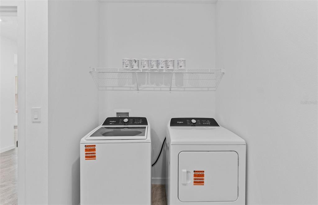 6909 Southwest 90th Place Ocala, FL 34476 - Photo 12 of 20 a utility room with dryer and washer