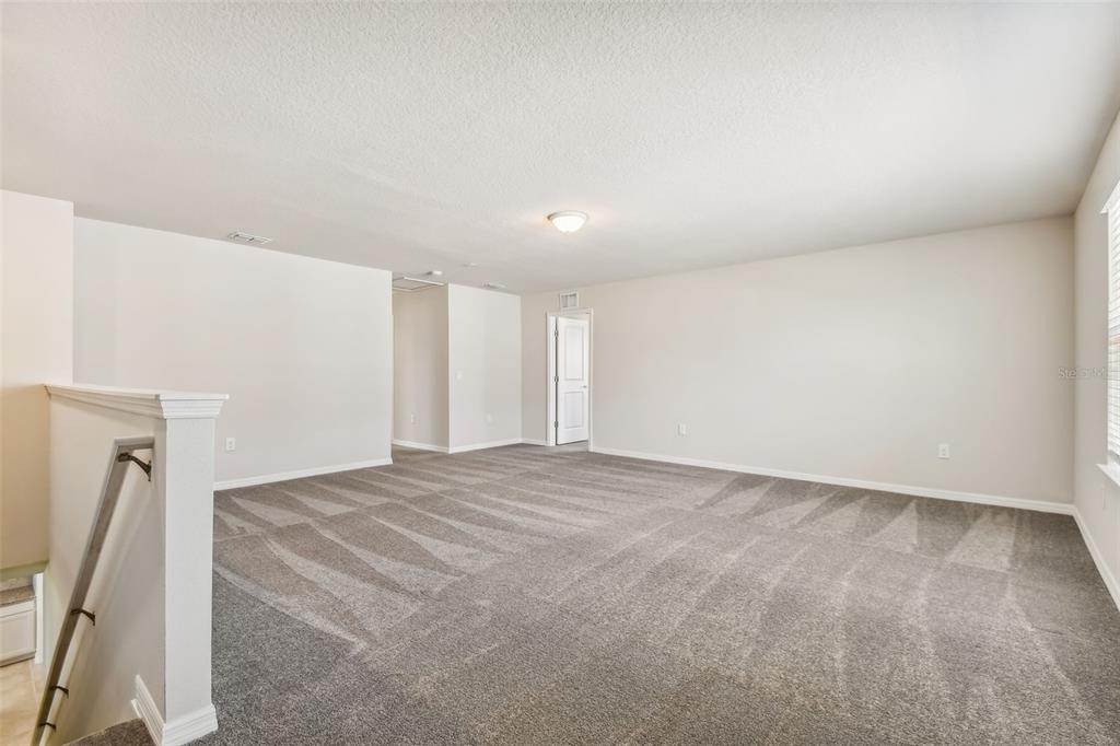 6909 Southwest 90th Place Ocala, FL 34476 - Photo 13 of 23 a view of an empty room