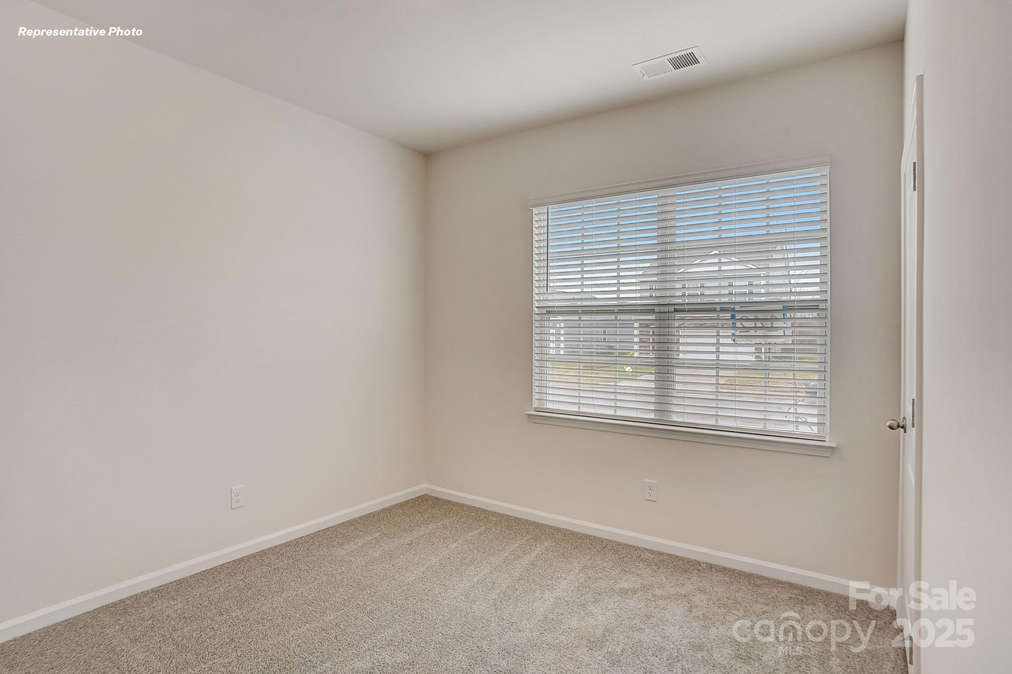 2687 Goose Fair Road Maiden, NC 28650 - Photo 11 of 24 a view of an empty room with a window