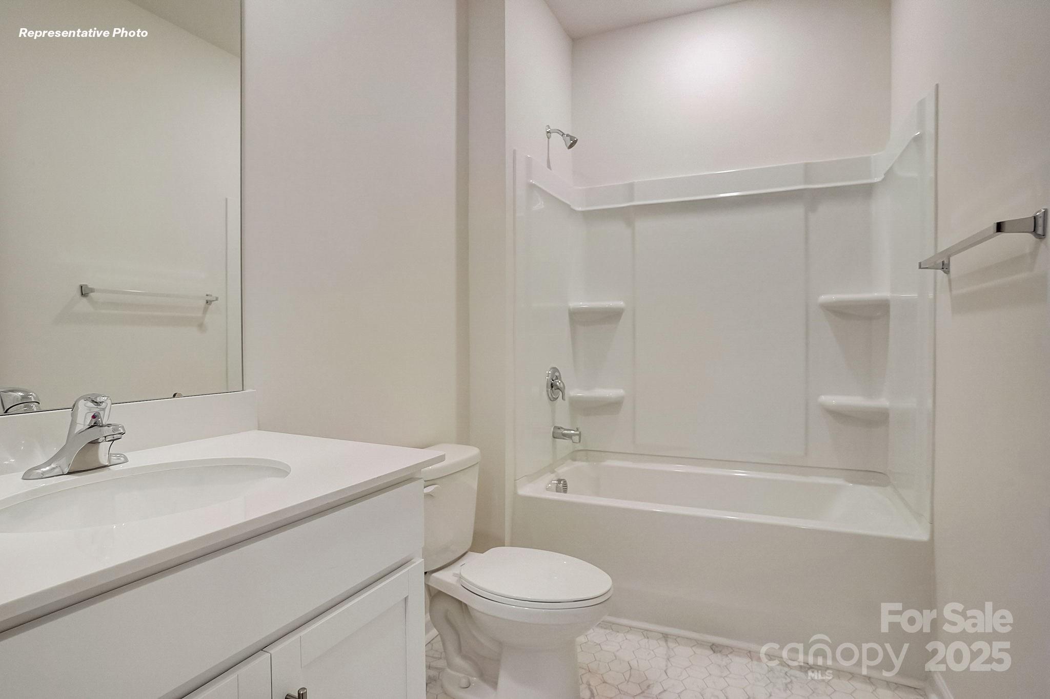 2687 Goose Fair Road Maiden, NC 28650 - Photo 13 of 24 a bathroom with a sink toilet vanity and shower