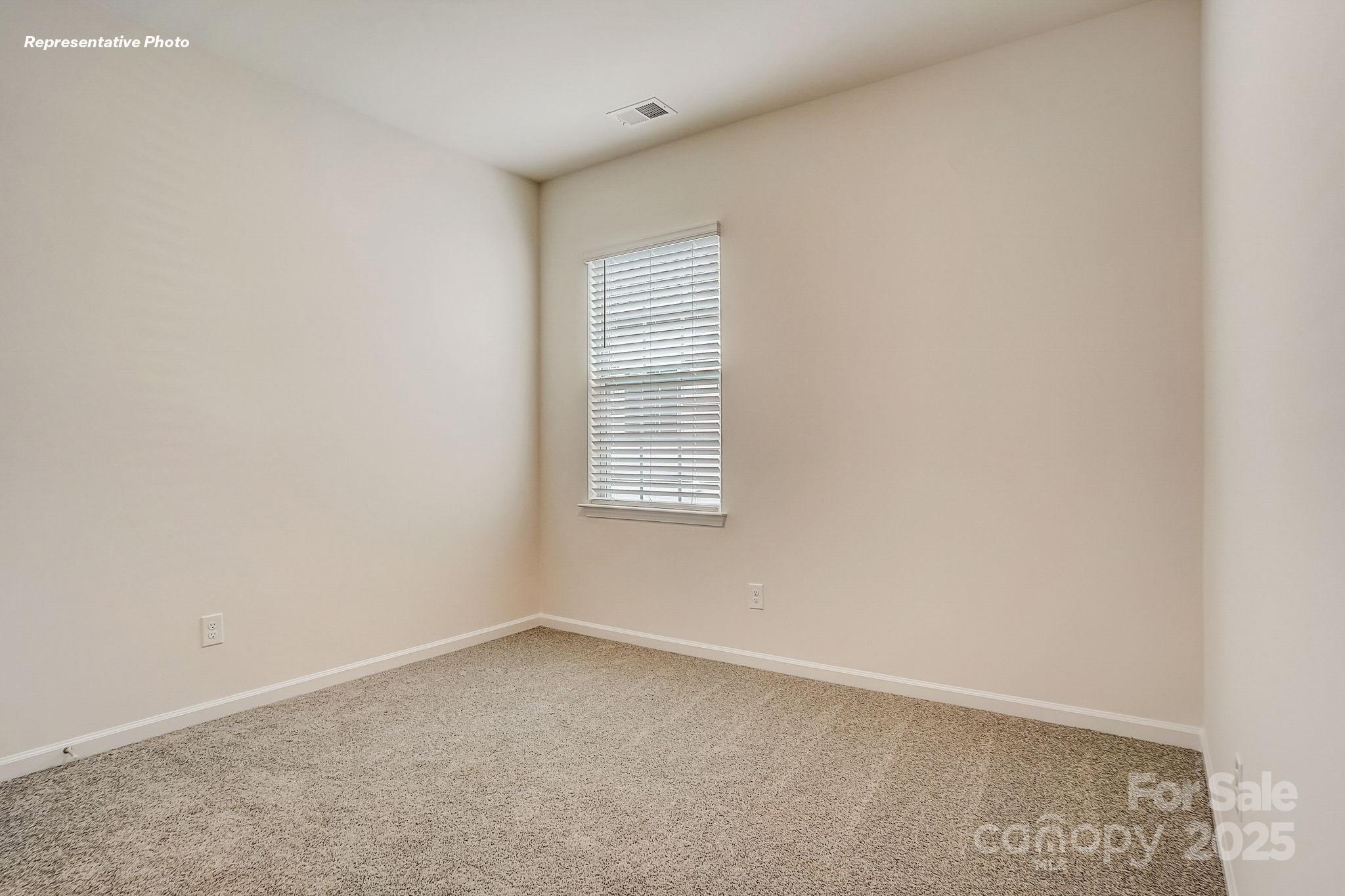 2687 Goose Fair Road Maiden, NC 28650 - Photo 14 of 24 an empty room with a window
