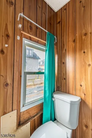 a bathroom with a toilet and a sink